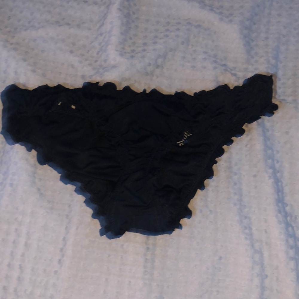 Black swimming suit bottom, cinched butt